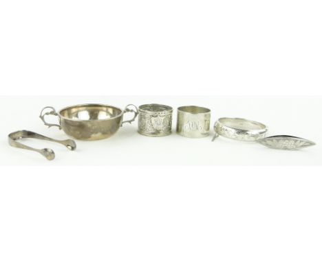 A group of silver items,
including 2-handled bowl, napkin rings, bangle, etc.