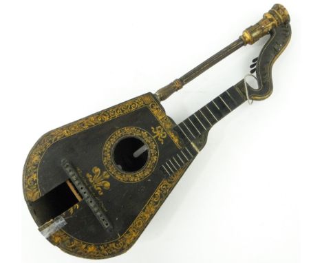 A harp-lute by Wheatstone
with gilded decoration.