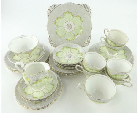 Tuscan China tea service for 6 people
with flower head design "Lotus" pattern.