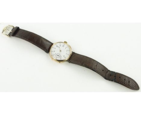 A Vintage 14ct gold cased wristwatch circa 1900
with enamel dial and snakeskin strap, case width 33mm.