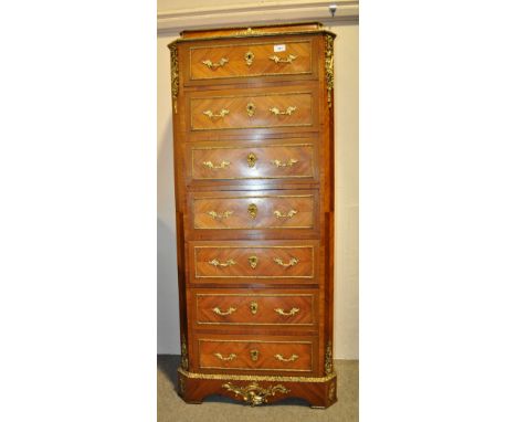 A fine quality French kingwood narrow chest of 7 drawers,
having concave frieze with 7 drawers under, shaped apron and bracke