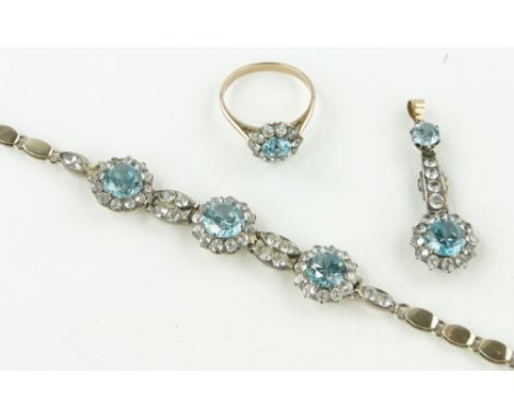 A suite of blue zircon jewellery comprising
bracelet, pendant and ring, silver gilt settings.