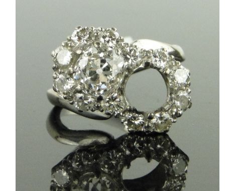 Large 18ct white gold diamond double cluster ring,
largest stone approx. 1ct, lacking 1 large stone, size K.