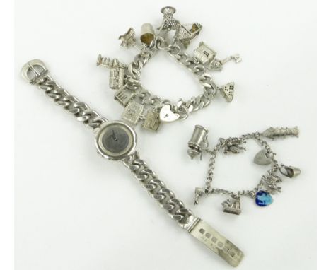 2 silver charm bracelets,
and a heavy silver wristwatch by Roy King, (3).