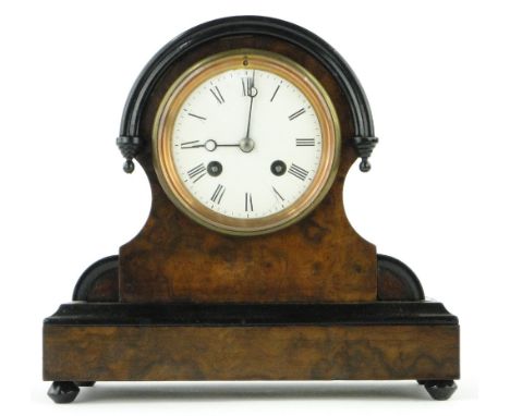 A Victorian walnut and ebonised mantel clock,
having a white dial with 2-train movement, height 9".