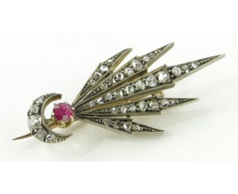 An unusual rose-cut diamond and ruby set comet design brooch,
unmarked gold and silver settings, length 35mm.