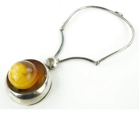 A large silver and amber set costume necklace,
import hallmarks, pendant height 78mm.