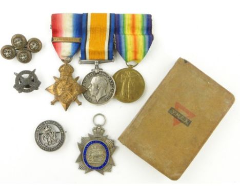 Group of First World War medals 
to Pte. E Spriggs, East Kent Regiment.1-7599, other badges and newspaper cuttings.