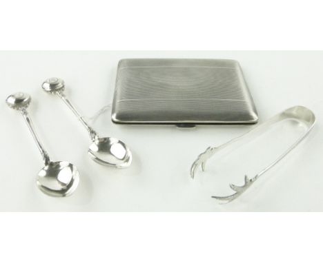 An engine turned silver cigarette case,
and 3 other silver items, 6.5oz gross.
