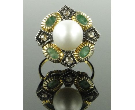 A large 14ct gold pearl, emerald and diamond cluster ring,
setting height 20mm, size O.