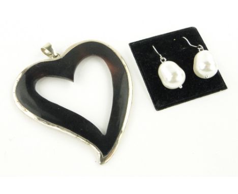 Pair of large pearl and silver earrings
and a tortoise shell and silver pendant.