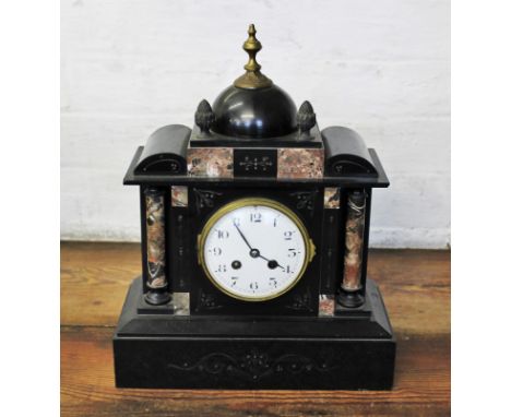 A late 19th century slate and marble eight day mantel clock, with Arabic dial and movement striking on a gong, 38cm high, wit