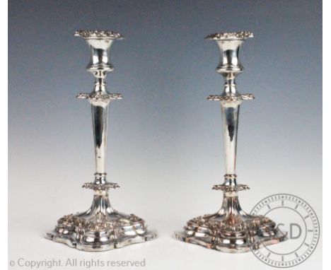 A pair of Old Sheffield silver plated candlesticks, 32cm high (2)