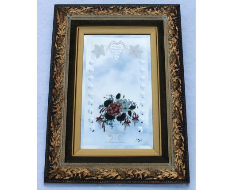 A pair of late Victorian wall mirrors, each rectangular plate worked with convex roundels and convex grape detailing, with pa