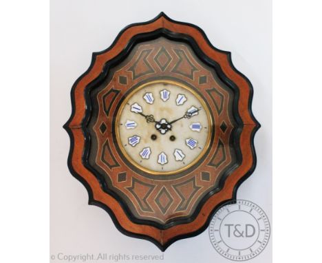 A late 19th century French Vineyard clock, the circular dial with Roman numeral dials within a brass inlaid and ebonised case