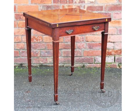 An Edwardian mahogany envelope card table, with drawer, on fluted and tapered legs, 75cm H x 60cm W