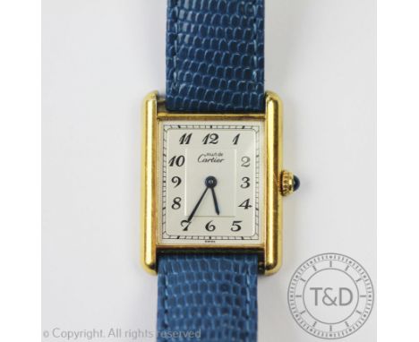 A ladies Must De Cartier Vermeil Tank Quartz, 925 wristwatch, the rectangular case enclosing Arabic numeral dial, with caboch