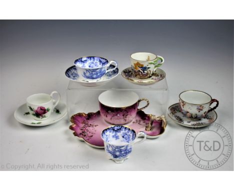 A selection of European porcelain teacups and saucers to include a 19th century Naples Capodimonte example decorated in relie