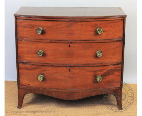 A late George III mahogany bow front chest, with three long drawers, on splayed bracket feet, 91cm H x 100cm W x 56cm D (some