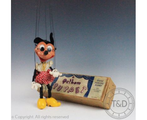 A Pelham Puppet Minnie Mouse, circa 1950's, within original box CONDITION REPORT: Circular patch to top of head with chipping