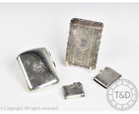 A Victorian silver calling card case George Unite Birmingham 1873, of shaped rectangular form and with engine turned detail, 