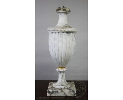 A Neo-classical veined white marble lamp, of fluted urn form, on square base, 59cm H (as found) CONDITION REPORT: Lighting lo