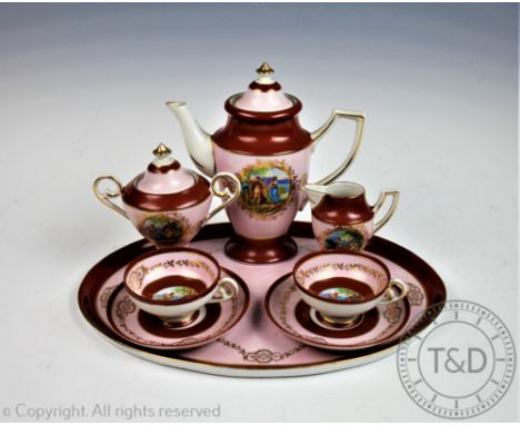 A late 19th century Austrian porcelain coffee service, possibly Vienna, comprising; a coffee pot, 18cm high, a sucrier, 12cm 
