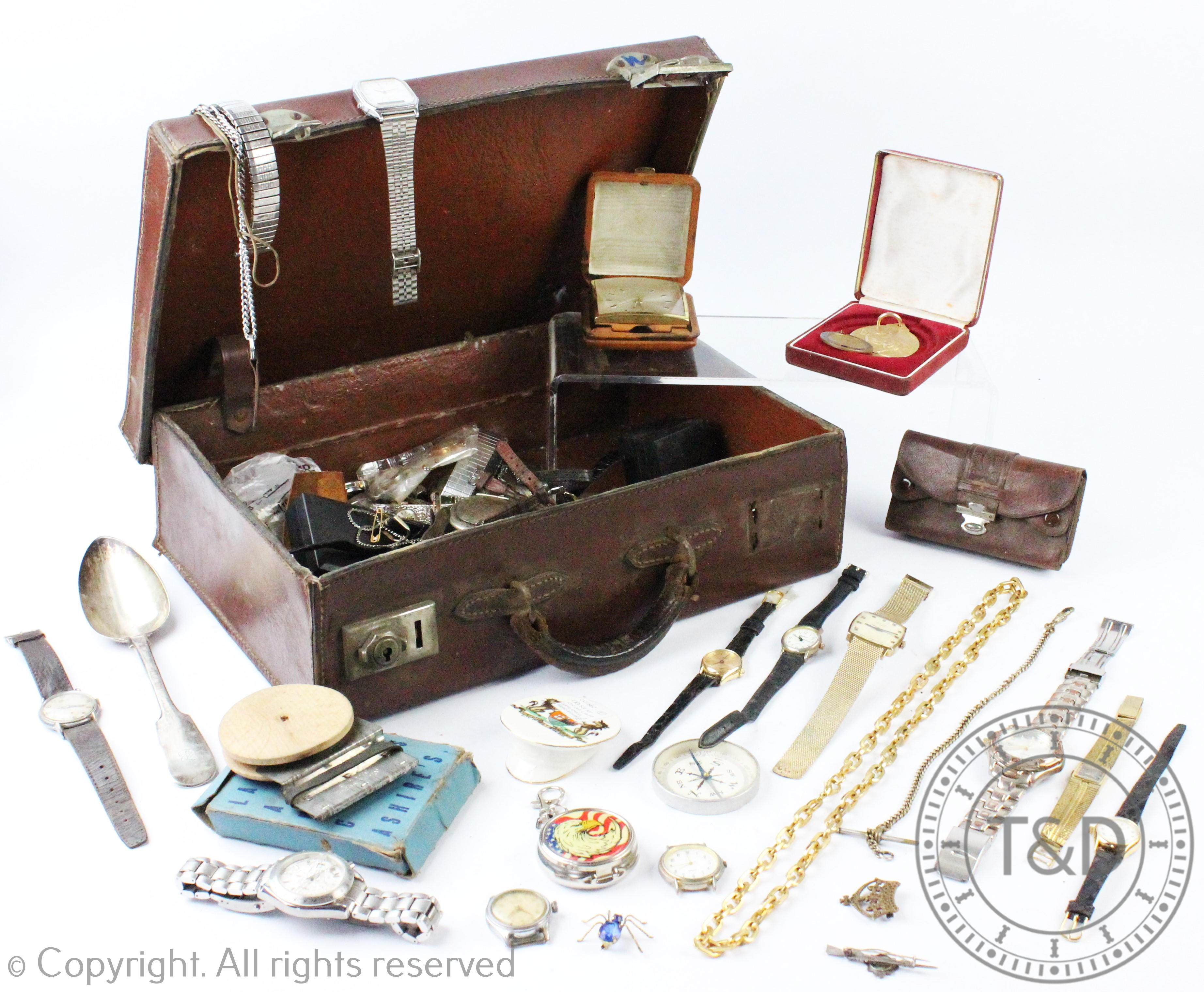 A suitcase containing an assorted collection of pocket watches