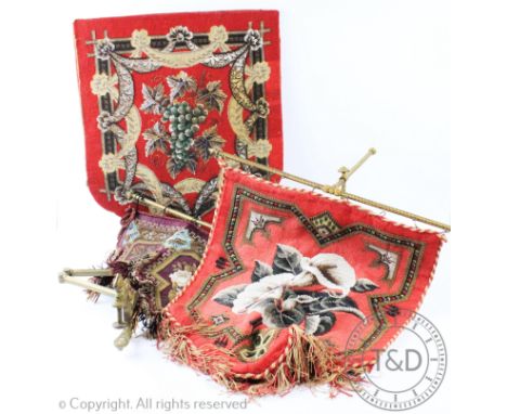 Three Victorian gilt brass hinged wall bracket screens, each hung with a different beadwork floral panel, tallest 81cm H (3)