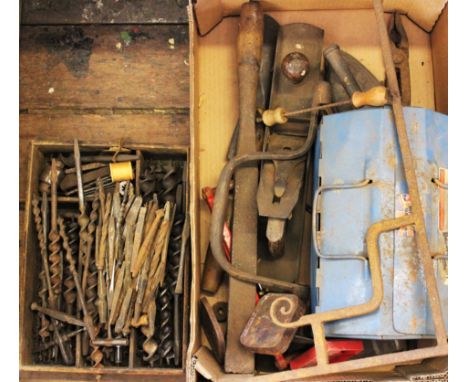 A selection of 19th century and later vintage hand tools and farming accessories, including large drill pieces, (Qty)