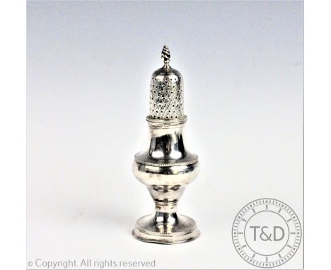 A George III silver sugar caster, George Gray, London 1784, the baluster shaped body raised on a circular foot with beaded de