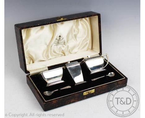 A cased silver Art Deco condiment set William Neale &amp; Son Ltd Birmingham 1937, each of plain polished rectangular form an