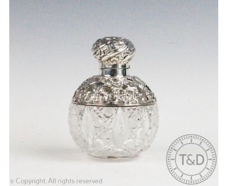 A silver mounted glass scent bottle, James Deakin &amp; Sons, Chester 1897, the pierced mount with birds and scrolling foliag