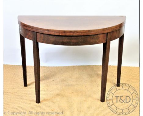 A George III style 'D' shaped card table, on tapered legs, 69cm H x 96cm W x 48cm D, with an Edwardian mahogany display cabin