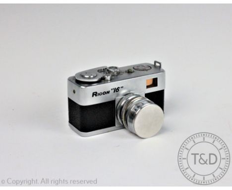 A Ricoh 16" miniature camera with attached Riken 1:2.8 No.10176 f=2.5cm lens with cap