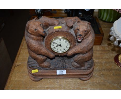 A Sligh mantel clock decorated with bears