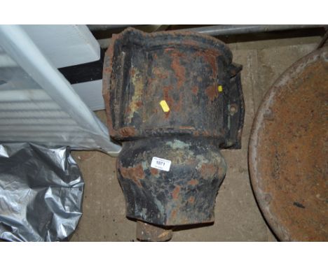 A large ornate rain hopper