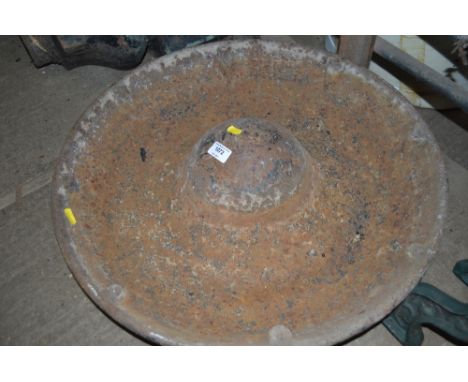 A cast iron pig trough 