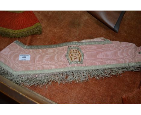 An embroidered sash 
