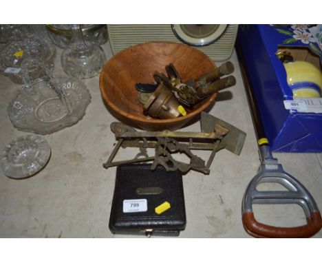 A turned wooden fruit bowl and contents; brass scales etc