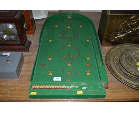 A bagatelle board 