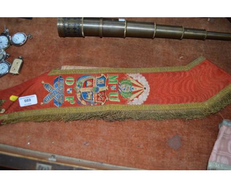 An embroidered sash 