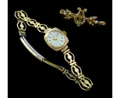 Gold and seed pearl harp bar brooch and a 9ct gold Rotary wristwatch on plated bracelet Condition Report Click here for furth