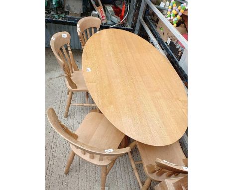 Light oak dining table along with 4 beech farmhouse dining chairs