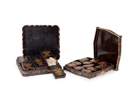 TWO JAPANESE GILT-DECORATED LACQUER BOXES 19TH-20TH CENTURY 十九至二十世紀 黑漆描金花籃、扇紋套盒兩件（帶數小盒、含百餘螺鈿游戲芯片） one of lobed square form, p