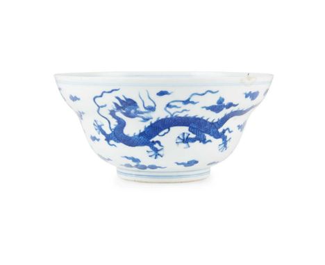 BLUE AND WHITE 'DRAGON' BOWL QING DYNASTY, DAOGUANG MARK, 19TH CENTURY 清 道光款 青花雙龍戲珠紋折腰碗 thinly potted on a short ring foot, r