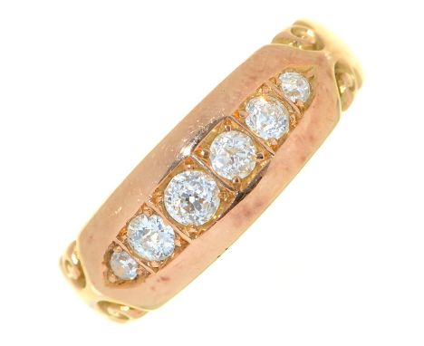 A six stone diamond ring, with old cut diamonds, in gold marked 15ct, 4.3g, size O Wear consistent with age