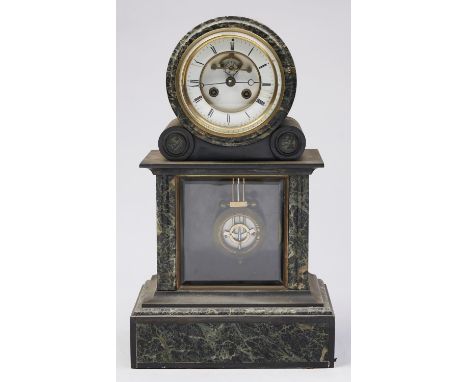 A French nero belge and green marble mantel clock, late 19th c, with Brocot escapement and enamel dial, the integral pedestal