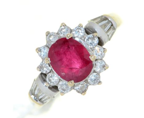 A ruby and diamond cluster ring, with trapeze diamond shoulders, in white gold marked 18k, 5.2g, size J Good condition