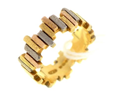 An 18ct three colour gold ring, maker G E P, London 1966, 7.2g, size K Wear consistent with age